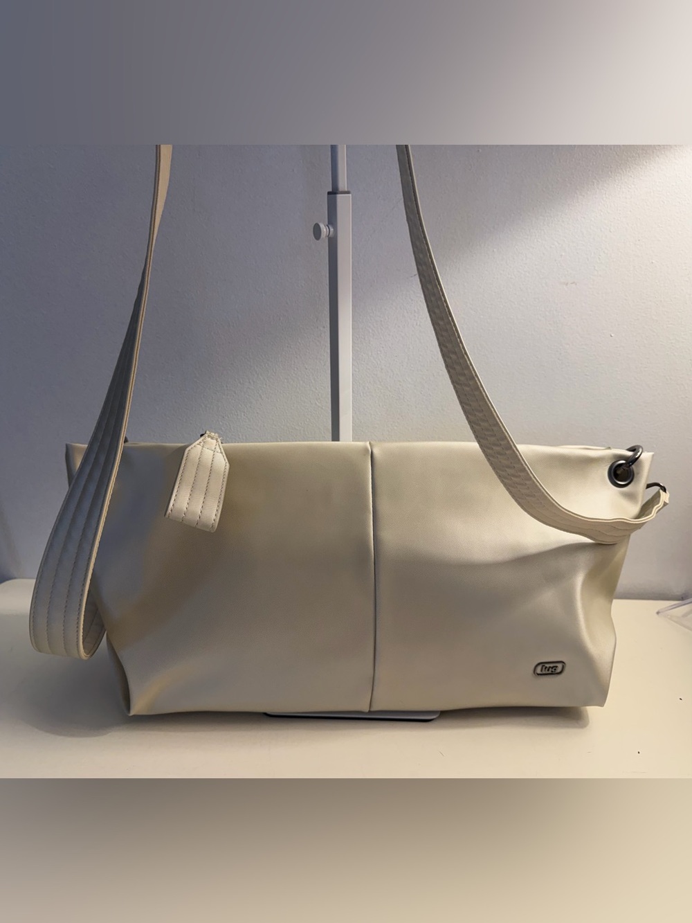 Lug Half Plunge Satin Luxe VL Crossbody Bag in the color Champagne